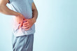© JaRiRiyawat - man suffering from backache,Lower back pain.