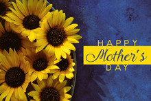 Sunflowers On Blue Background With Happy Mothers Day Text
