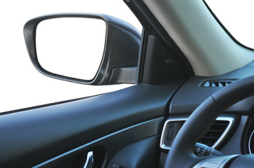 Car interior with a side-view mirror isolated on white