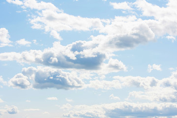 Wall Mural - blue sky with fluffy clouds, abstract background