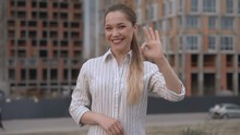 Its OKAY! Atractiv Business Girl Confidently Looks At The Camera And Shows Ok Gesture. Success Concept 4K