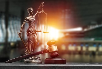 Poster - Statue of the lady of justice with scales and gavel on the desk