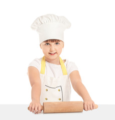 Poster - Cute little chef with rolling pin on white background