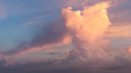 Wall Mural - Cinemagraph Continuous Loop. Still Image Cloud Animation. View of a Dramatic Cloudscape during a vibrant and colorful sunrise or sunset. Nature Background