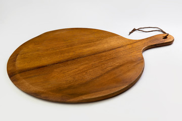 Wooden cutting board isolated on a white background