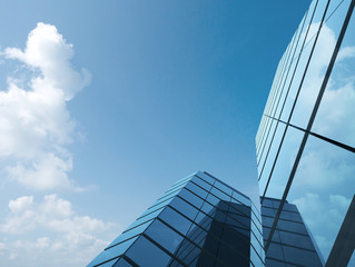 Poster - View of high rise glass office building and dark steel window system on blue clear sky background,Business concept of future architecture,looking up to the top of building with sun light. 3d render.
