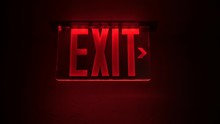 Red Exit Sign In A Nightclub