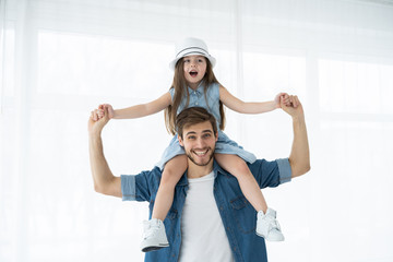 Happy loving family. Father and his daughter child girl playing together. Father's day concept