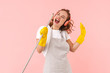 Housewife isolated holding broom listening music