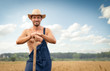 Sexy shirtless farmer in field