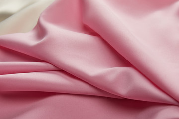 Canvas Print - close up view of satin pink and white soft and wavy fabric