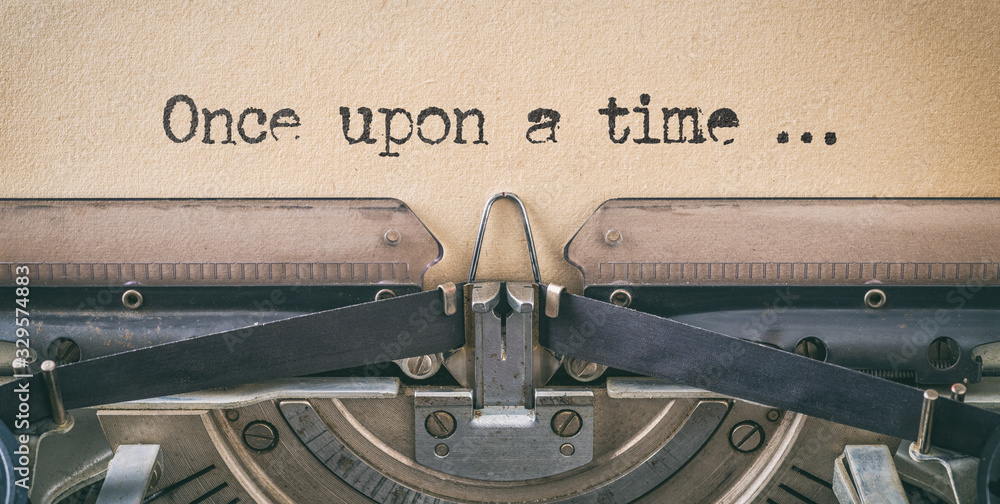 Text written with a vintage typewriter -  once upon a time - obrazy, fototapety, plakaty 