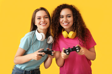 Sticker - Friends playing video game on color background