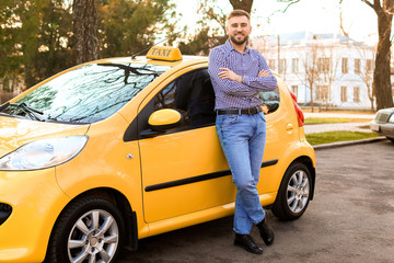 Poster - Portrait of handsome taxi driver outdoors