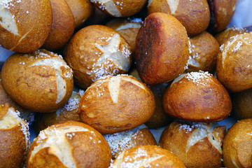 Pretzel bread rolls with salt