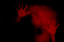 Red Shadow Of Woman On The Frosted Glass Representing Dangerous, Fear, Help, Haunting, Horror,  Scary, Lockdown, Infected, Virus And Plague