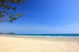 Fototapeta Sawanna - Beautiful white clouds on blue sky over calm sea with sunlight and clear sky.