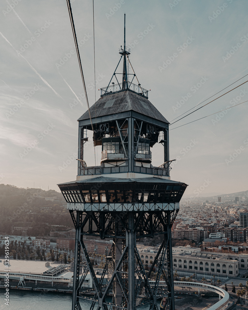 cable car tower through the port of barcelona at sunset Stock Photo ...