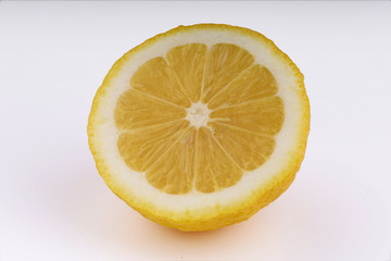 Canvas Print - Yellow lemon closeup cut white background