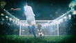 Soccer scene at night match with player in a white and blue uniform kicking the penalty kick