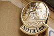 © OceanProd - notary golden board sign gold logo entrance building office for french Notaire