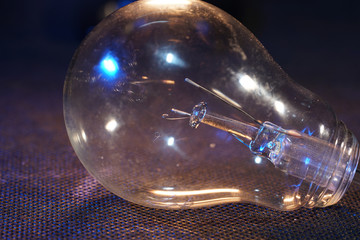 Wall Mural - Old lightbulbs in the studio on black background photographed with flash light