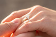 diamond ring in hand