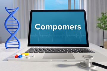 Compomers – Medicine/health. Computer in the office with term on the screen. Science/healthcare