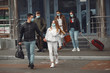 © prostooleh - Travelers leaving airport are wearing protective masks.