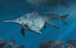 A massive creature prowls the depths of a Triassic  sea. This is shastasaurus, an ichthyosaur, and the largest marine reptile ever. 3D Rendering.