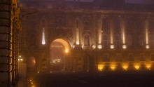 Royal Palace Budapest In The Night Fog In The Light Of Lanterns With An Arch View