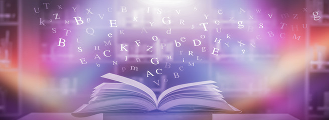 Imagine opening an old book blurred with magic power on the table and the English alphabet floating above the book with magic light as a beautiful background design.