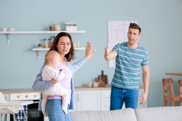 Poster - Stressed couple suffering from postnatal depression at home