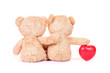 © suthisak - Red heart and two teddy bears sit back on white background. Love and relationship concept. Valentines concept.