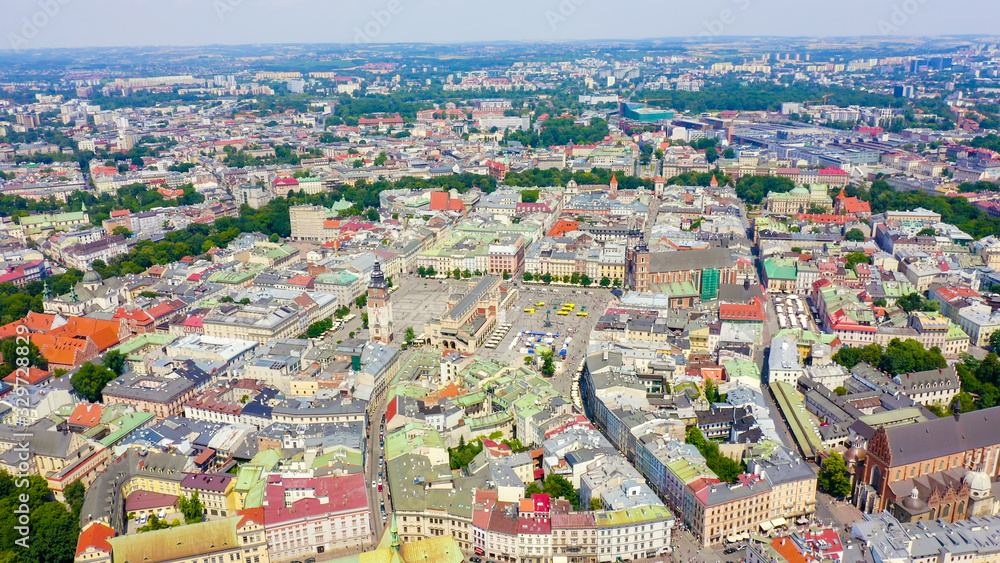 Krakow, Poland. Main Square. Big city square of the 13th century. View of the historic center, Aerial View - obrazy, fototapety, plakaty 