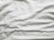 © Nattawut - Soft white wrinkled fabric background