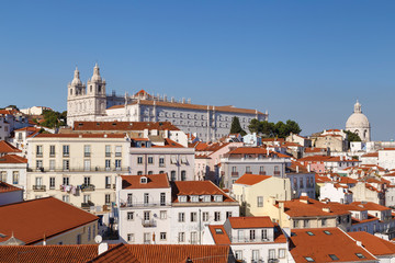 Wall Mural - Church of Sao Vicente of Fora (Igreja de Sao Vicente de Fora) and old buildings in Alfama and Graca districts in Lisbon, Portugal.