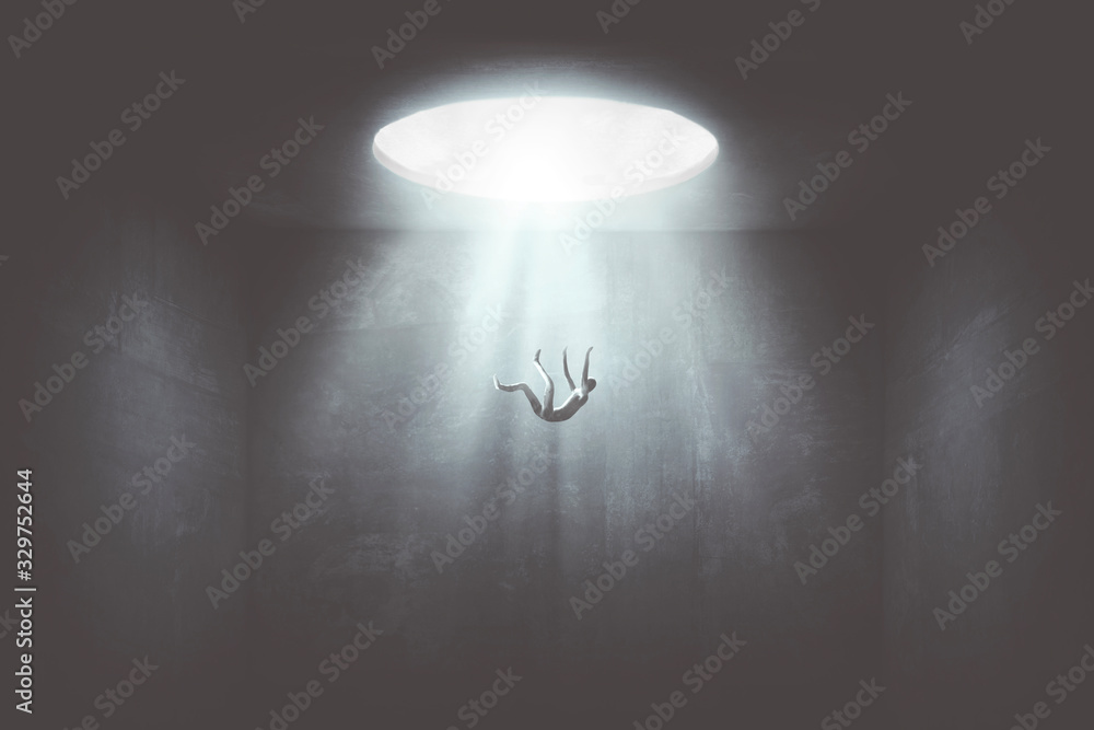 man falling down from a hole of light, surreal concept - obrazy, fototapety, plakaty 
