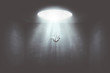 canvas print picture - man falling down from a hole of light, surreal concept