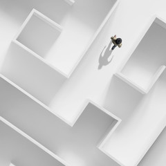 Wall Mural - man getting out of a complex maze; surreal business concept