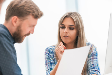 Wall Mural - young businesswoman at a meeting with the business team