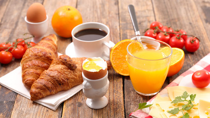 Canvas Print - breakfast with coffee cup, orange juice, egg, cheese and croissant