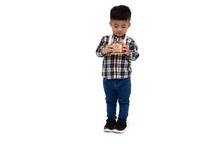 Attractive Asian Little Boy Photographer Wearing Striped Shirt Standing Isolated Over White Background, Taking A Picture With Toy Photo Camera, Two Year One Month Old
