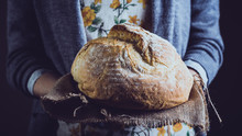 Girl Holding Fresh White Bread
