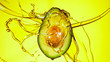© Lukas Gojda - Fresh cut avocado with oil stream. Concept of healthy fruit also useful in cosmetics.
