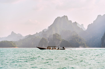 Thai passenger boat. Khao SOK national Park is nature reserve in South of Thailand with dense untouched jungles, limestone karst formations, an artificial lake Cheo LAN Surat Thani. February 26, 2020