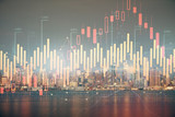 Fototapeta Miasto - Financial graph on night city scape with tall buildings background double exposure. Analysis concept.