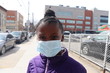 © 5D Media - Girl on street wearing surgical face mask