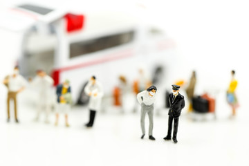 Miniature people : Doctor team with Ambulance, coronavirus covid 19 infected patient caution outbreak alert.