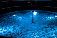 Dome Fountain With Blue Water At Night